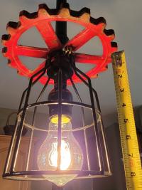 Repurposed Industrial Gear Pendant Lights, Red Black Steampunk. Original art pendants.